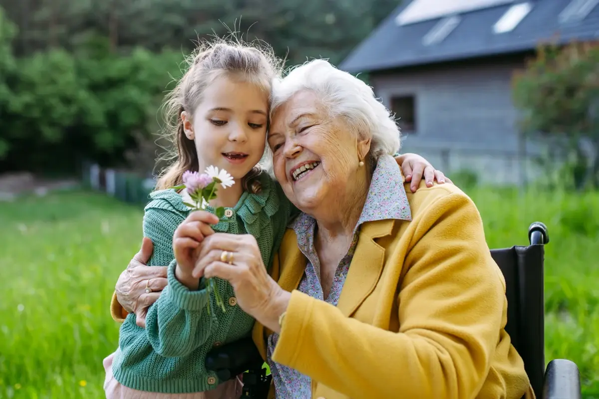 Eine ältere weibliche Person mit einem Mädchen