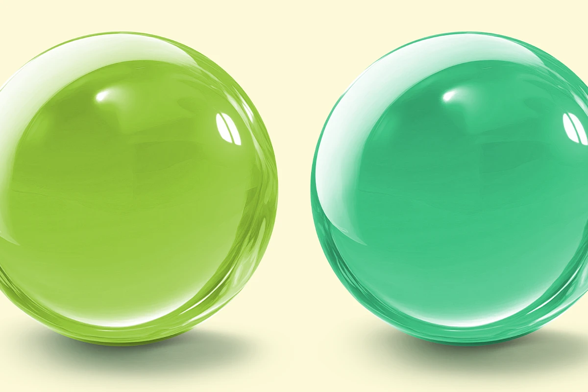 Eine hell und eine dunkel grüne Kugel